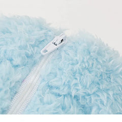 The Dog Face Cute Bear Dog Fur Coat in sky blue, detailed view of the zipper.