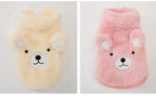The Dog Face Cute Bear Dog Fur Coat in yellow and pink, displayed flat on a surface.