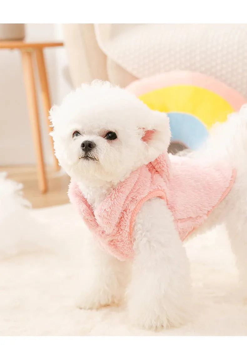 The Dog Face Cute Bear Dog Fur Coat in pink, shown on a dog from the front view.