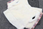 Close-up of the soft white fleece collar on a blue plaid dog coat