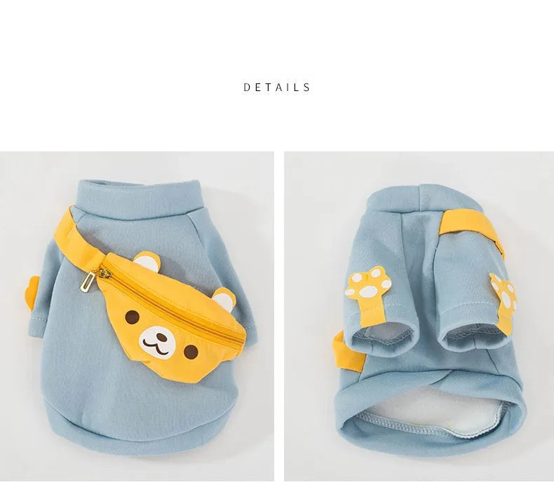 Detailed view of a light blue sweater with yellow accents and bear-shaped satchel, ideal Designer Dog Sweaters."