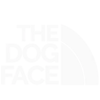 The Dog Face logo in white color