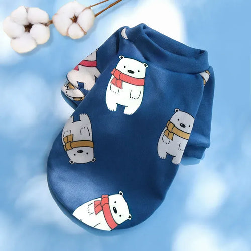 Designer Dog Coat featuring cute polar bears with scarves on a blue background, ideal for winter fashion.
