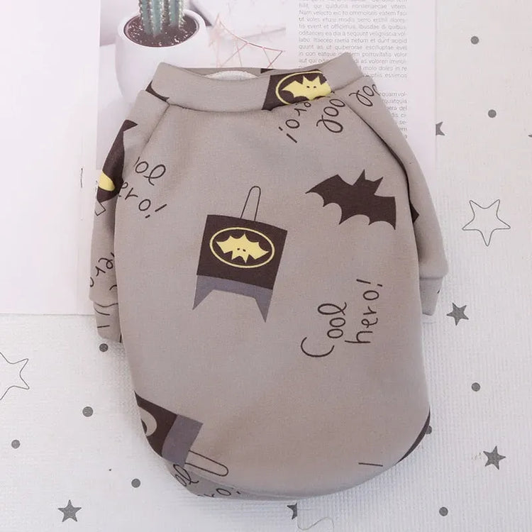 Designer Dog Coat in gray with a Batman theme, ideal for superhero fans and their pets.