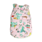 A pink dog coat with floral print, displayed flat, showing the entire design.
