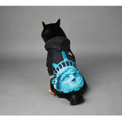 Dog wearing American Apparel Dog Hoodie in black and blue with a Statue of Liberty design, back view