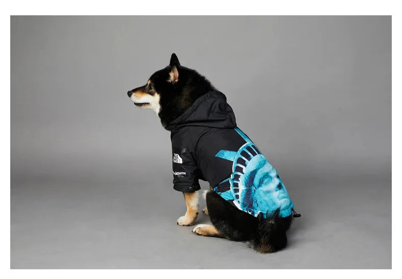 Dog wearing American Apparel Dog Hoodie in black and blue with a Statue of Liberty design, back and side view