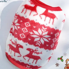 A festive red and white dog sweater featuring reindeer and snowflake patterns, perfect for very small dogs during the holiday season.